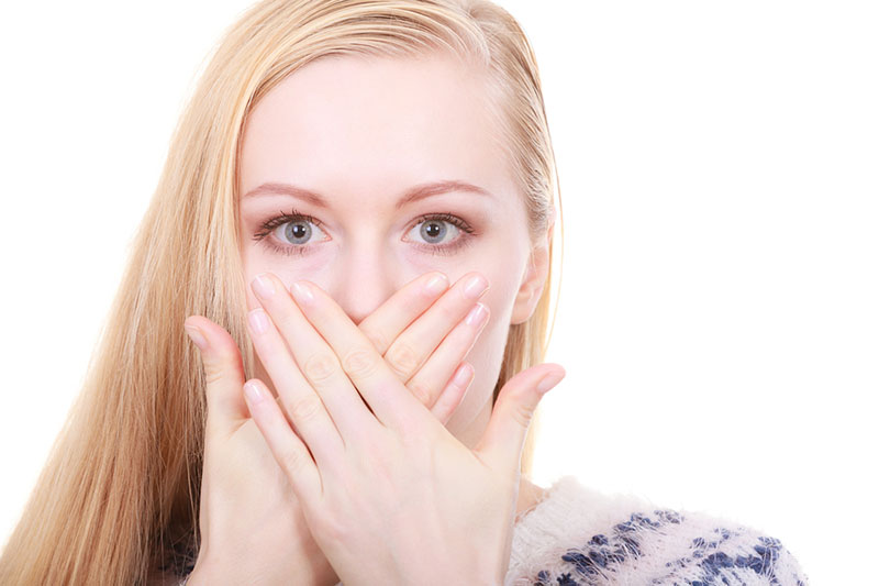shocked woman wants clean teeth